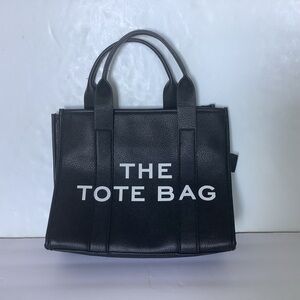 The tote bag Medium Faux Leather Black and White NWT